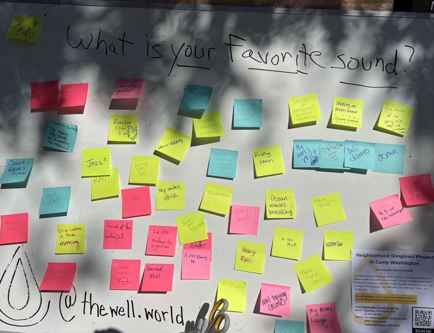 A board of sticky notes that people wrote their favorite sounds on