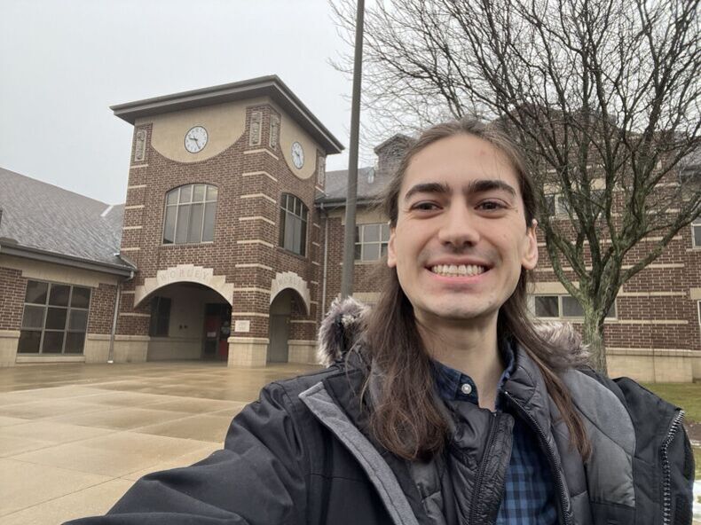 Bryce taking a selfie in front of Worley Elementary
